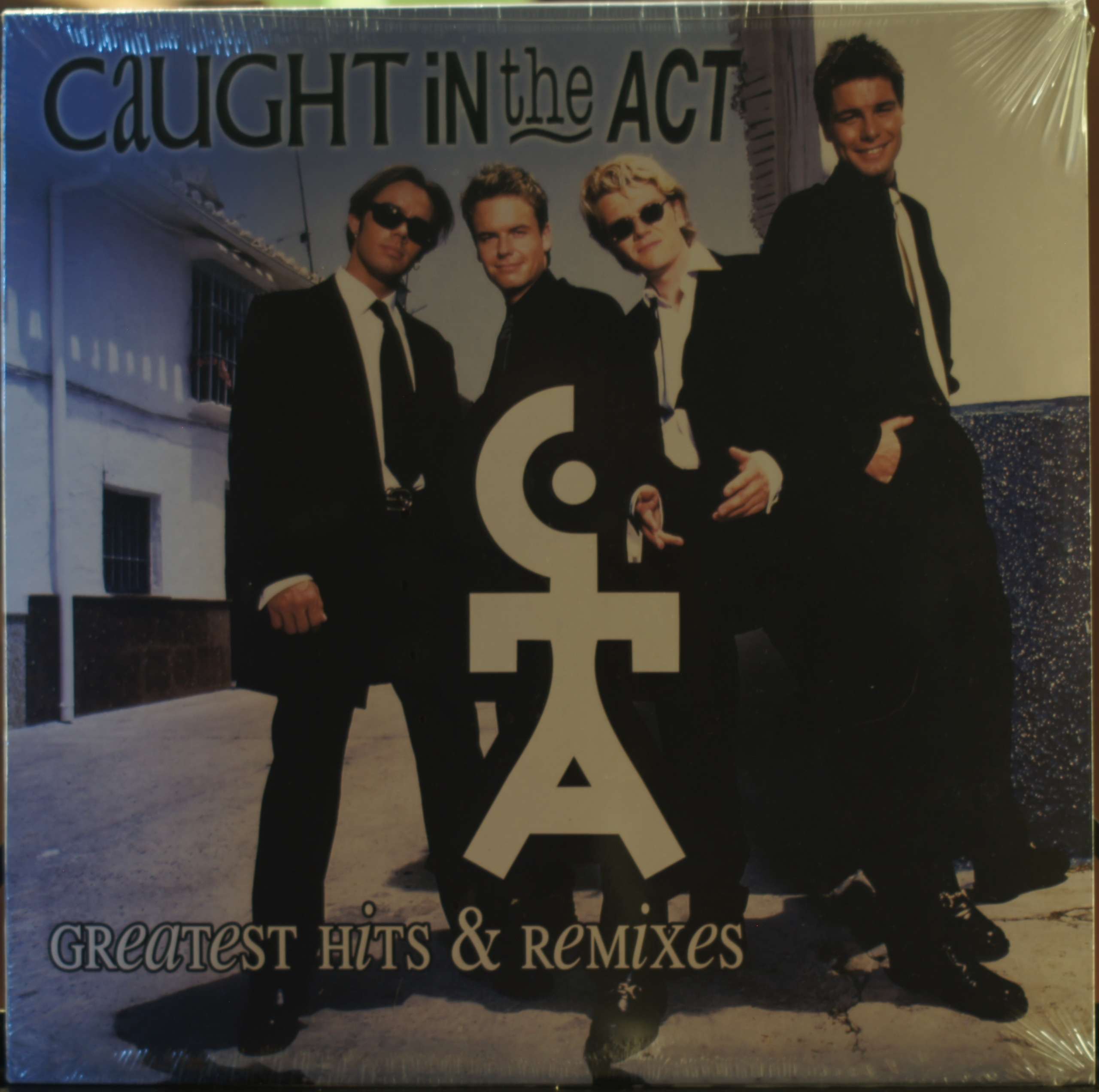 Caught In The Act - Greatest Hits & Remixes (Vinyl)